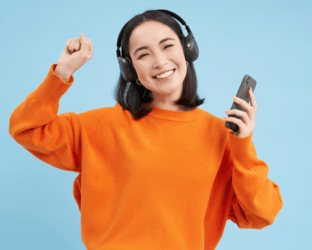 Person wearing headphones listening to music on a streaming platform